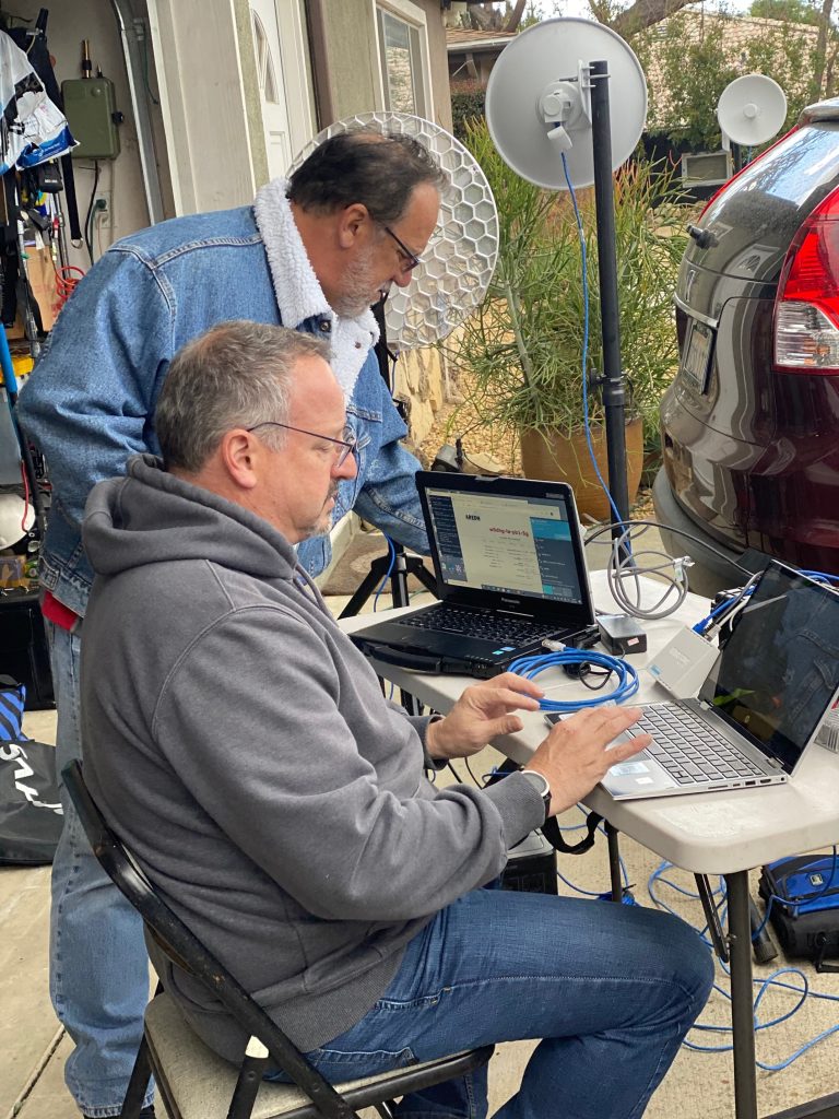 EPIC-FSC members David Goldenberg and Mike Schrage testing a portable amateur radio microwave data network.