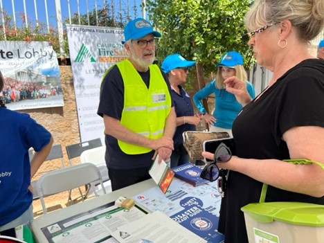 Brian Cameron provides emergency preparedness information at a community event