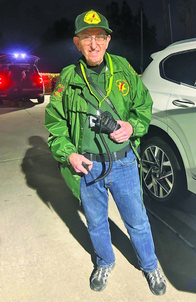 Norm Goodkin using FRS radio to assist in the Kenneth Fire